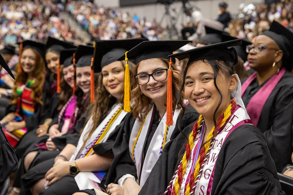 Candidates for graduation smile