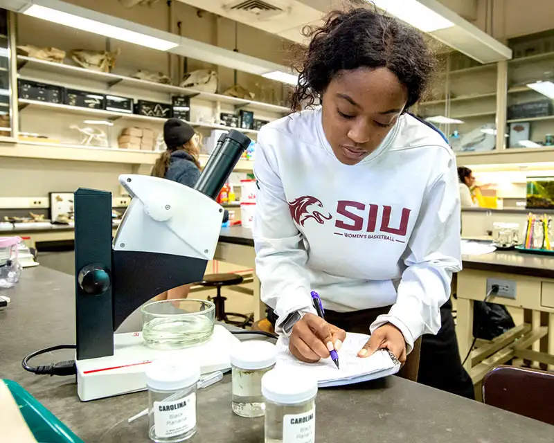 Student researcher in lab.