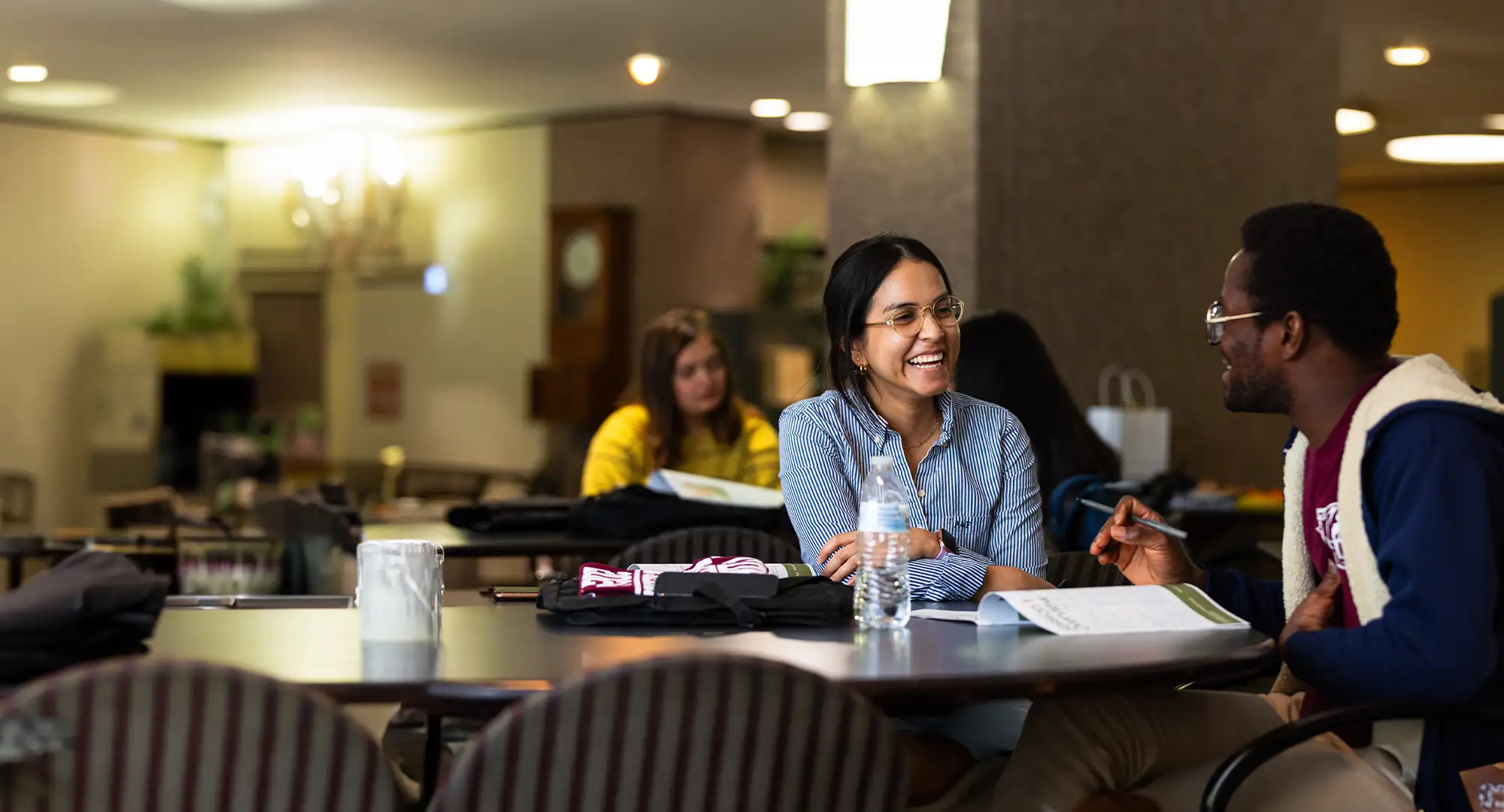 graduate students at table