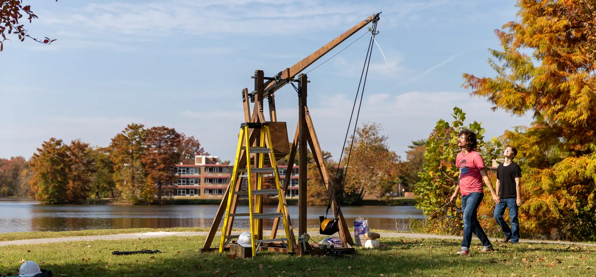 SIU engineering students build catapult using pumpkins as projectiles at the boat house on Campus Lake