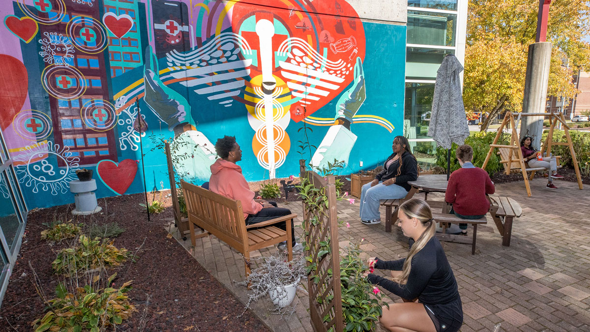 SIU students enjoy Saluki Covid Memorial Wellness Garden