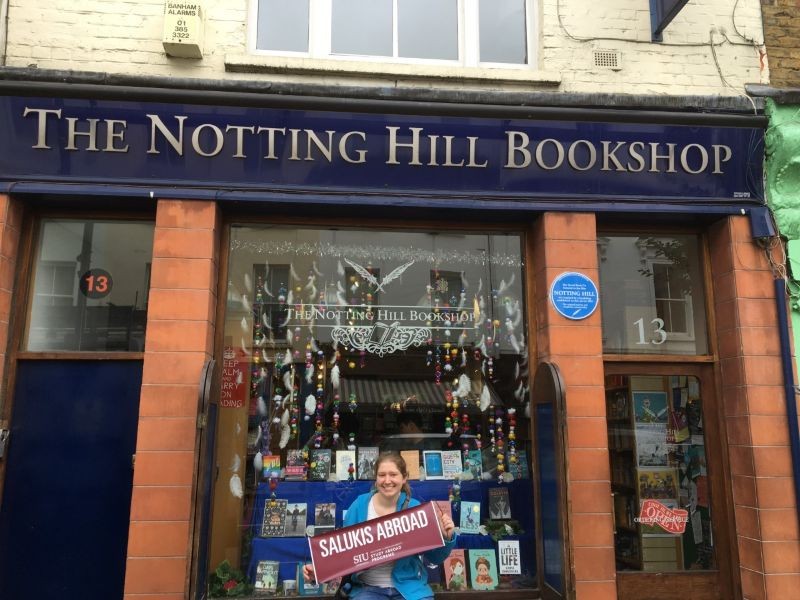 Student in front of Notting Hill Bookstore, London