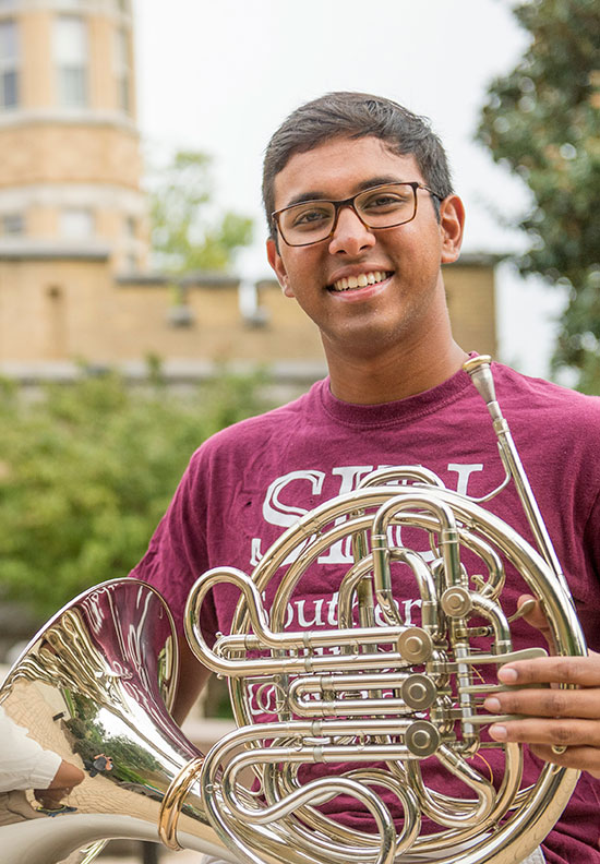 SIU Music Student outside Altgeld