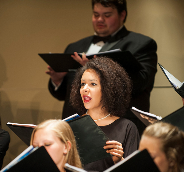 SIU music student playing wind instrument