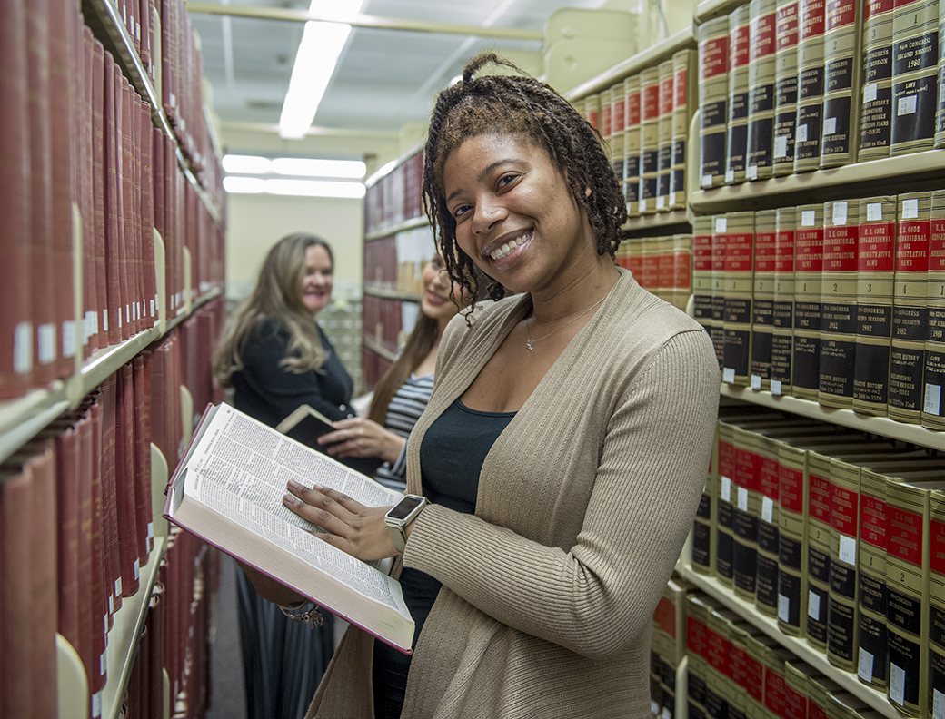 SIU Paralegal Student with book